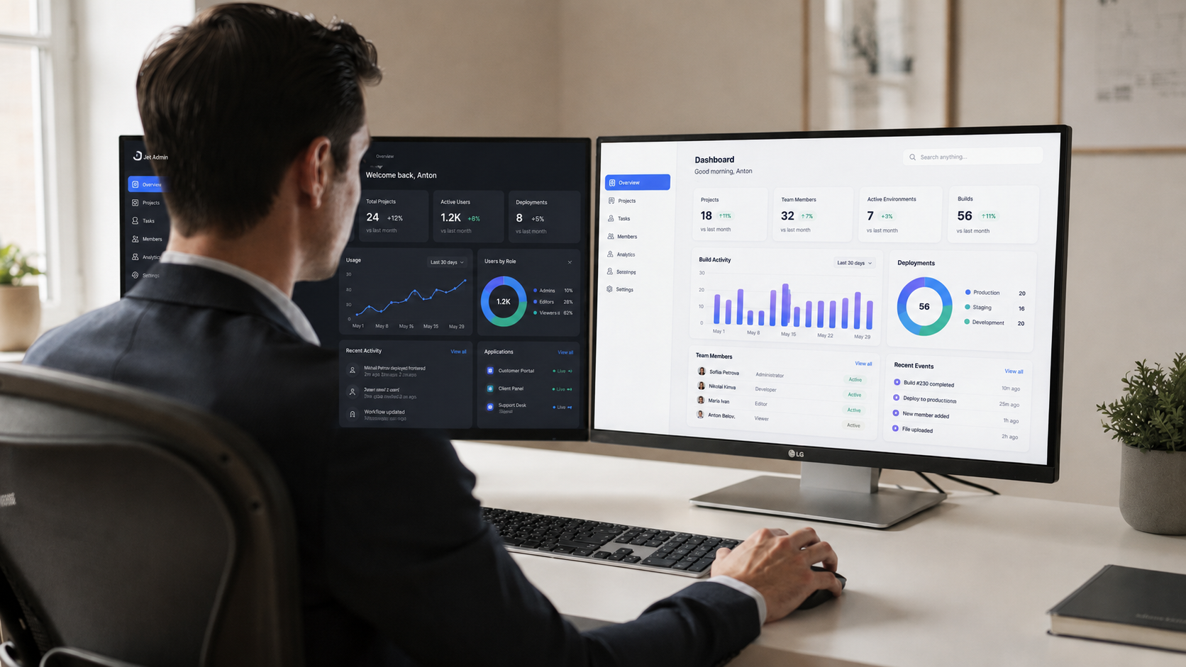 A person is seated at a desk, intently comparing two application dashboards displayed side by side on dual monitors. The setup suggests a focus on cloud development platforms, highlighting features such as role-based access control and team collaboration for building full stack web apps.