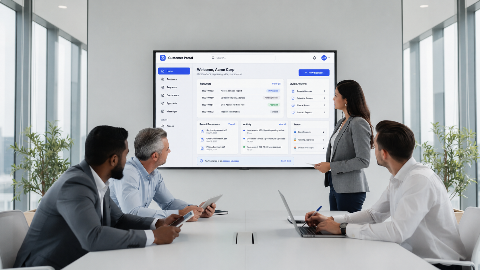 A diverse team of professionals is gathered around a large monitor in a bright office, engaged in reviewing a digital interface that likely relates to a client portal system. They are discussing project management and collaboration tools while considering how to enhance customer satisfaction through effective client communication and secure file sharing.